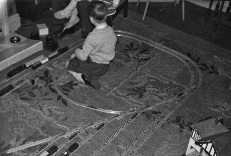 Bill playing with his train set at 80 Harefield Road - CLICK TO VIEW ZOOMED IMAGE Family image